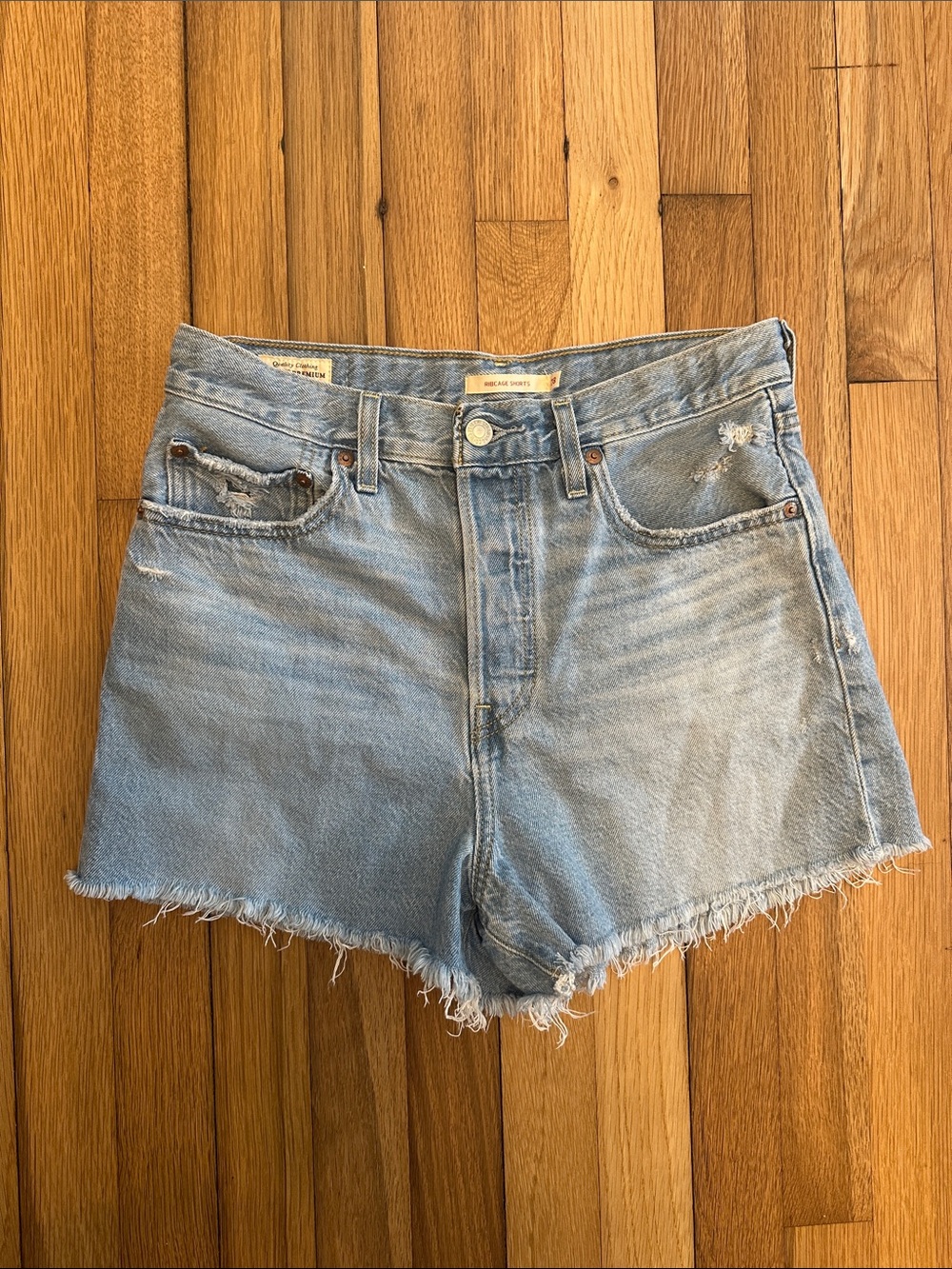 Levi's Ribcage Light Blue High-Rise Frayed Hem Denim Shorts